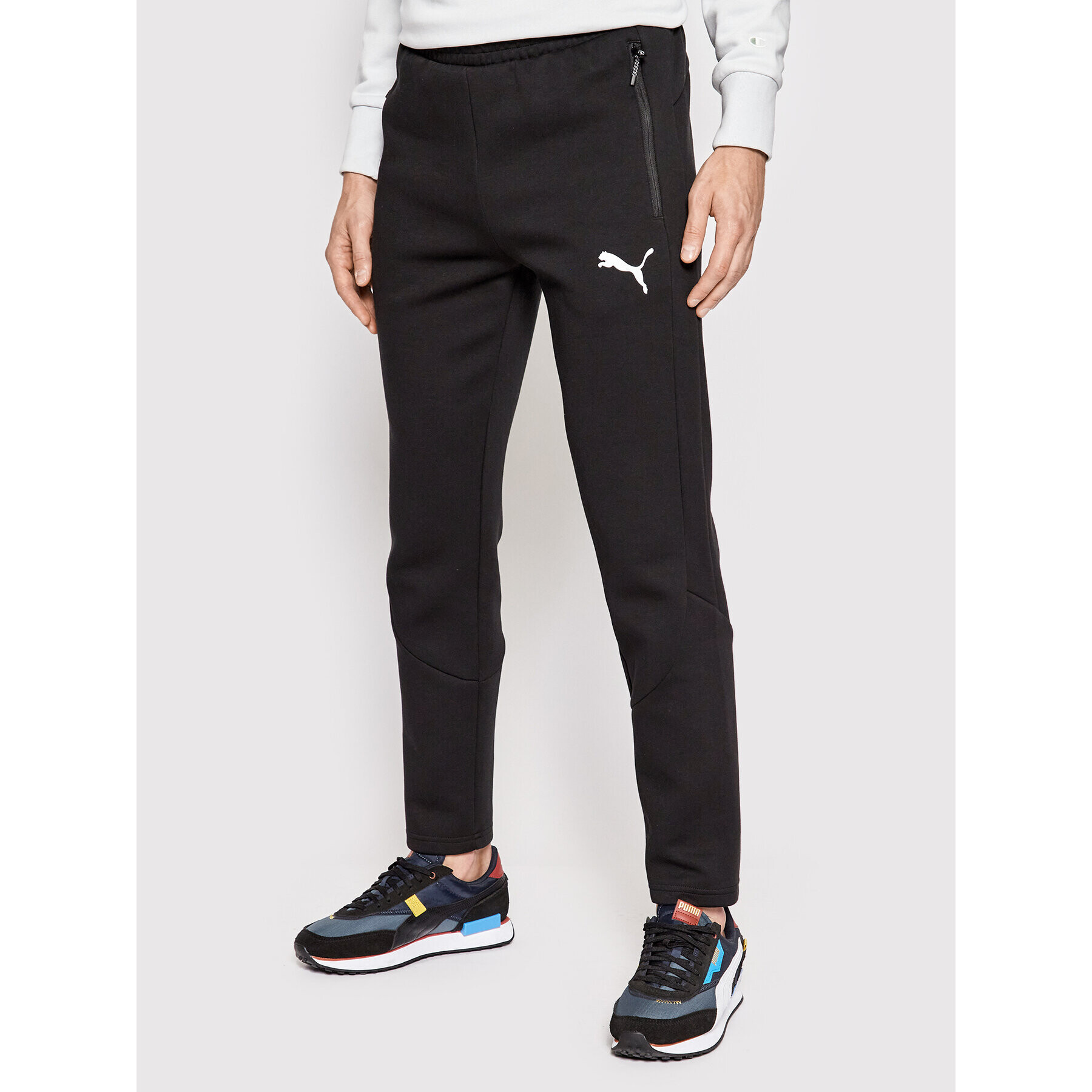 Puma Spodnji del trenirke Evostripe 847404 Črna Slim Fit - Pepit.si