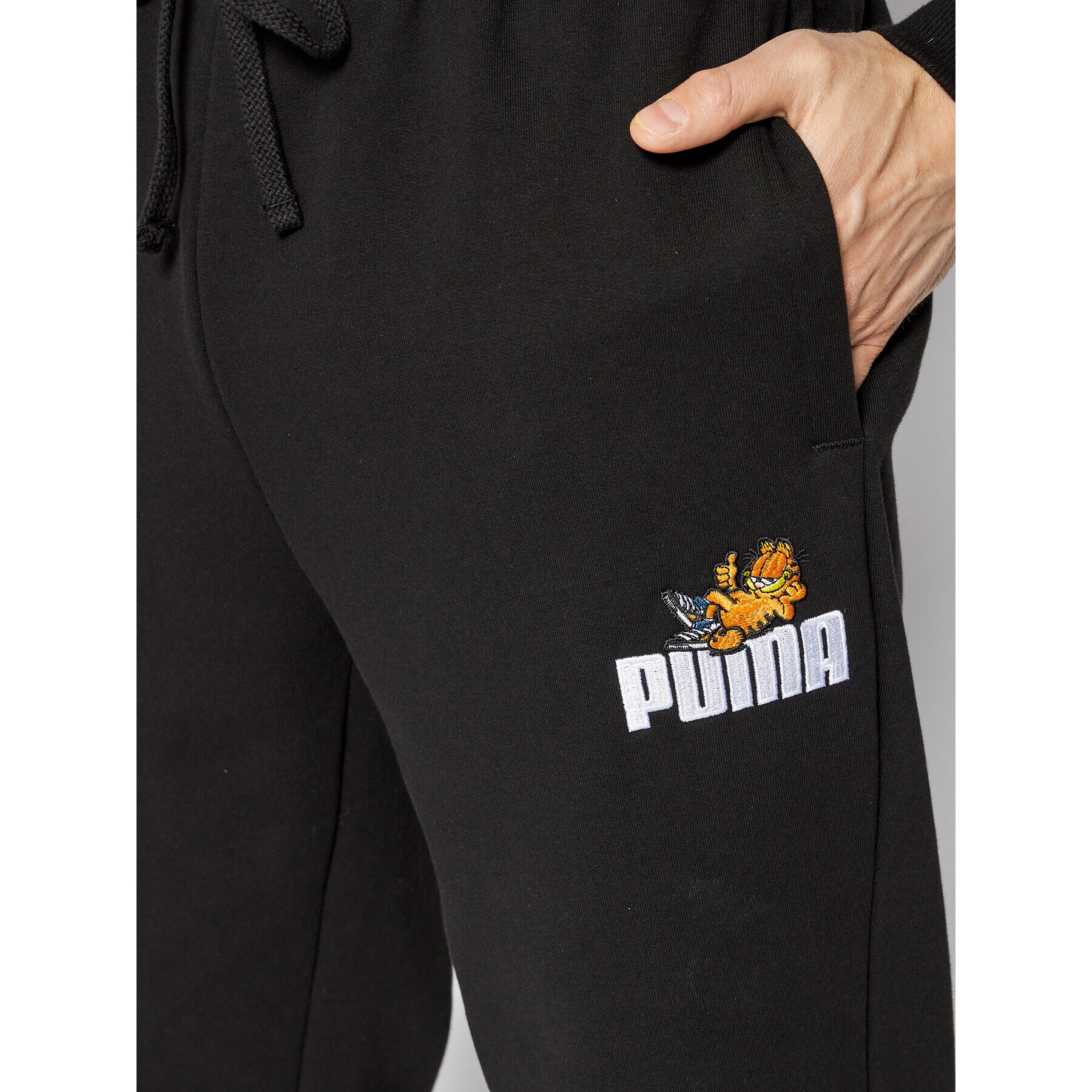 Puma Spodnji del trenirke GARFIELD 534436 Črna Regular Fit - Pepit.si