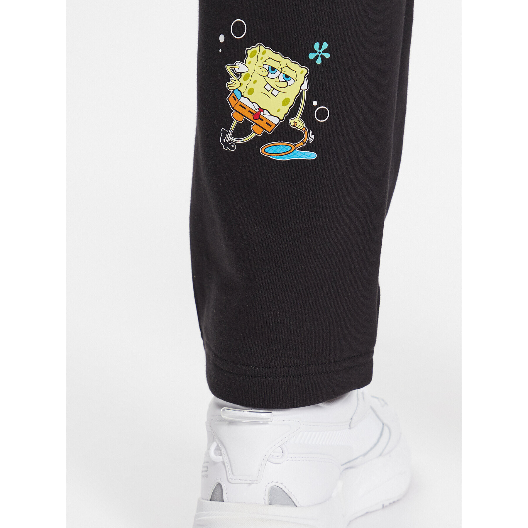 Puma Spodnji del trenirke SPONGEBOB 538963 Črna Regular Fit - Pepit.si