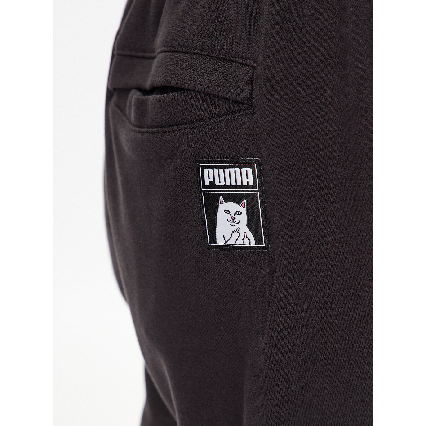 Puma Spodnji del trenirke X Ripndip 622199 Črna Relaxed Fit - Pepit.si