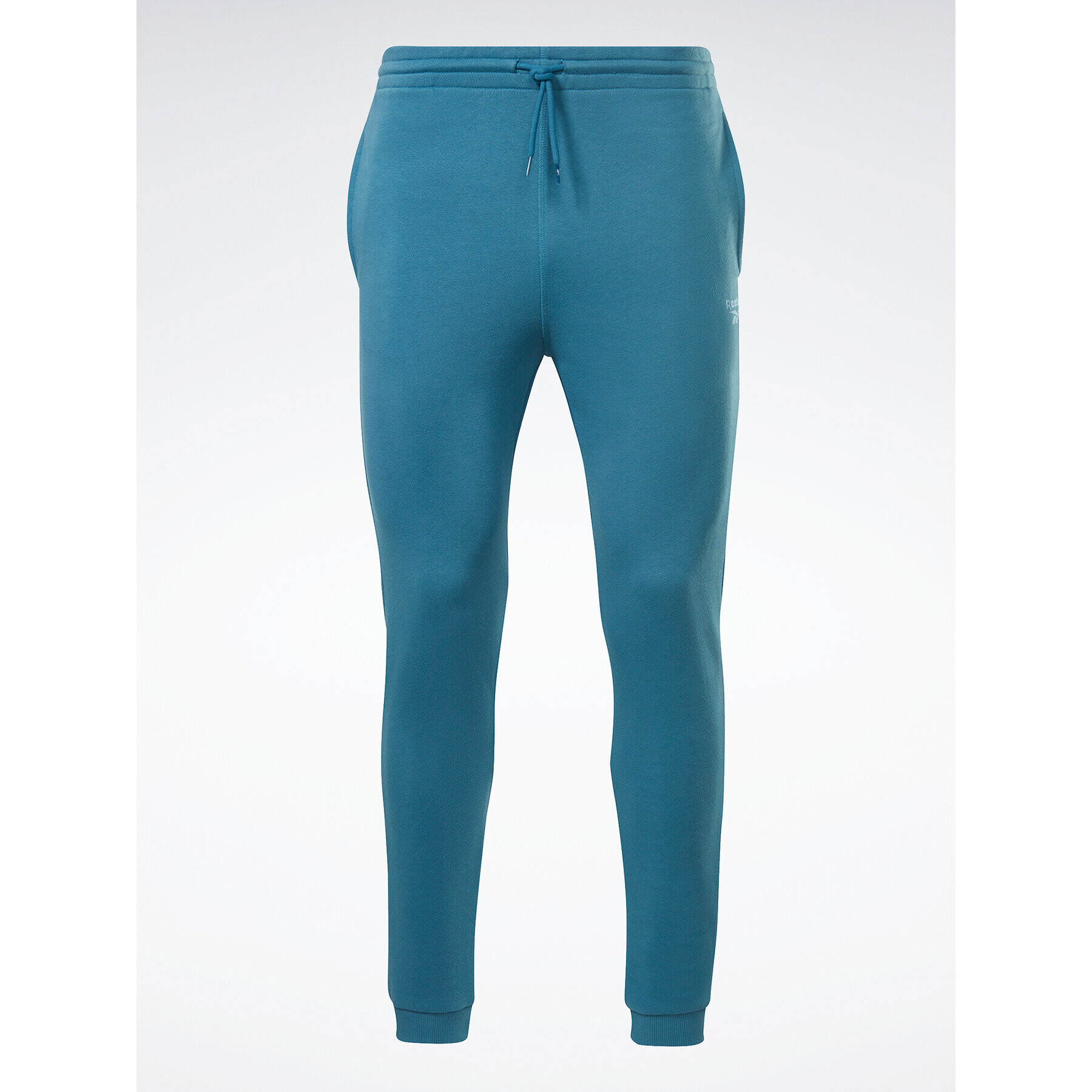 Reebok Spodnji del trenirke Identity French Terry Joggers H49680 Modra Regular Fit - Pepit.si