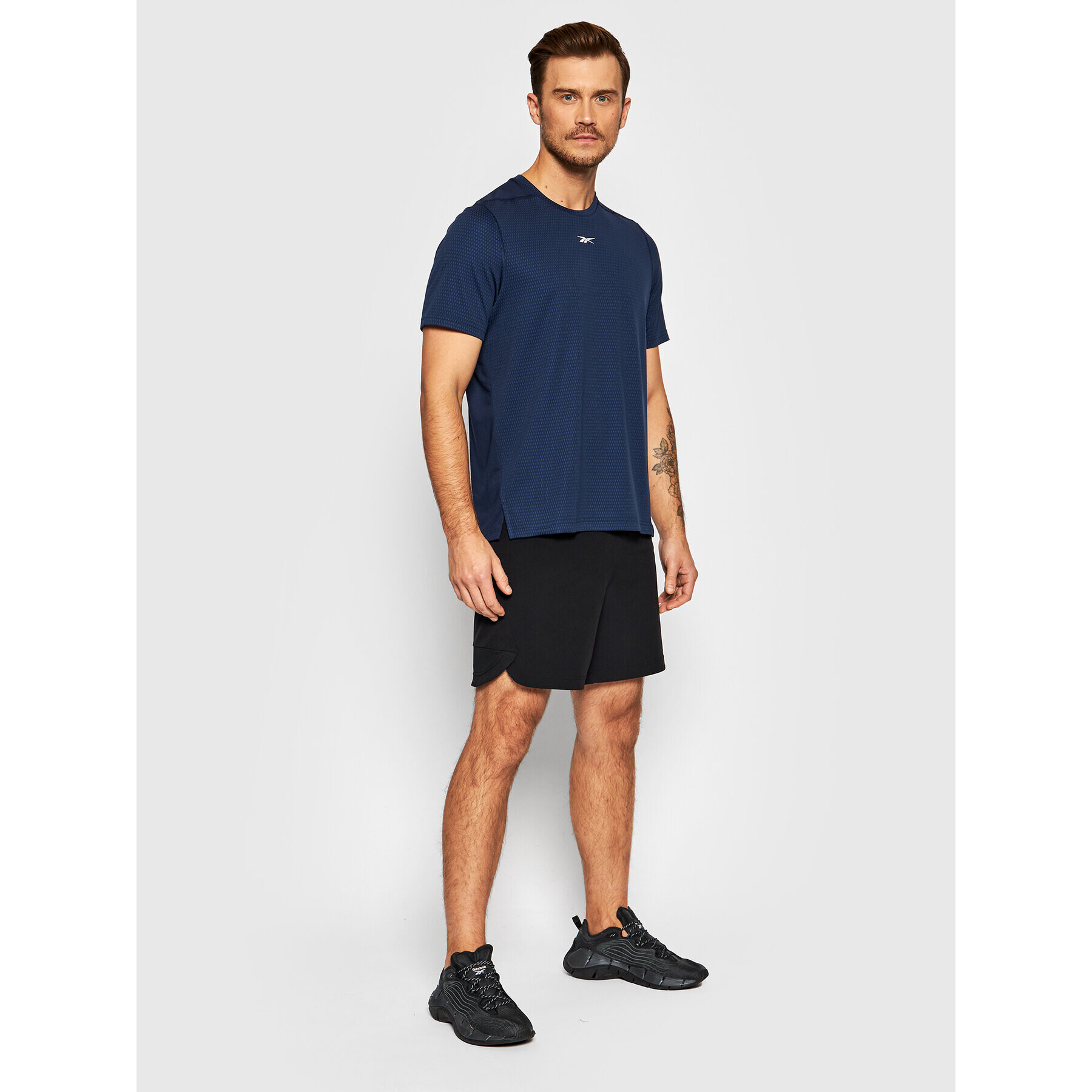 Reebok Športna majica Sweatshift Move GN9098 Mornarsko modra Slim Fit - Pepit.si