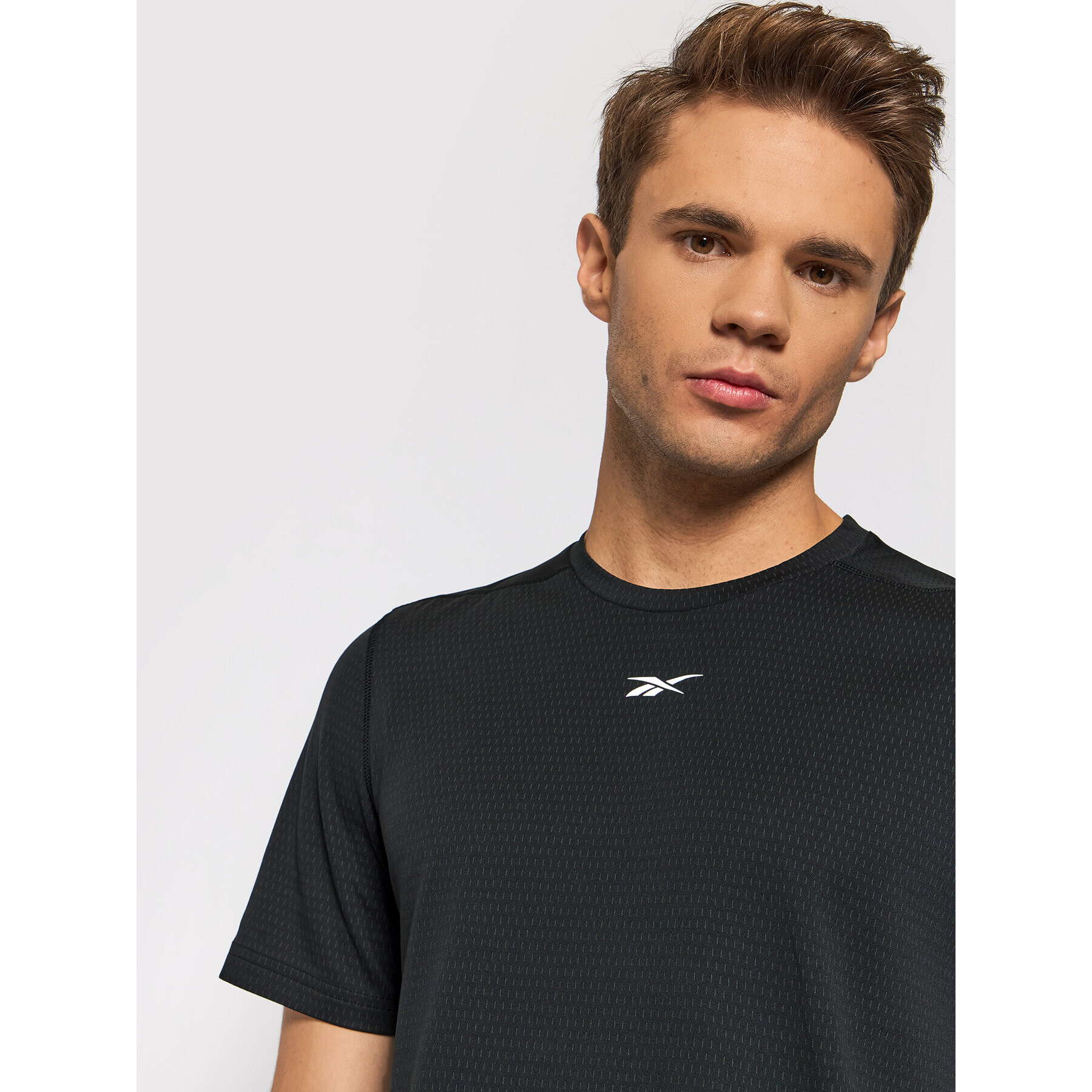 Reebok Športna majica Sweatshift Move GN9099 Črna Slim Fit - Pepit.si