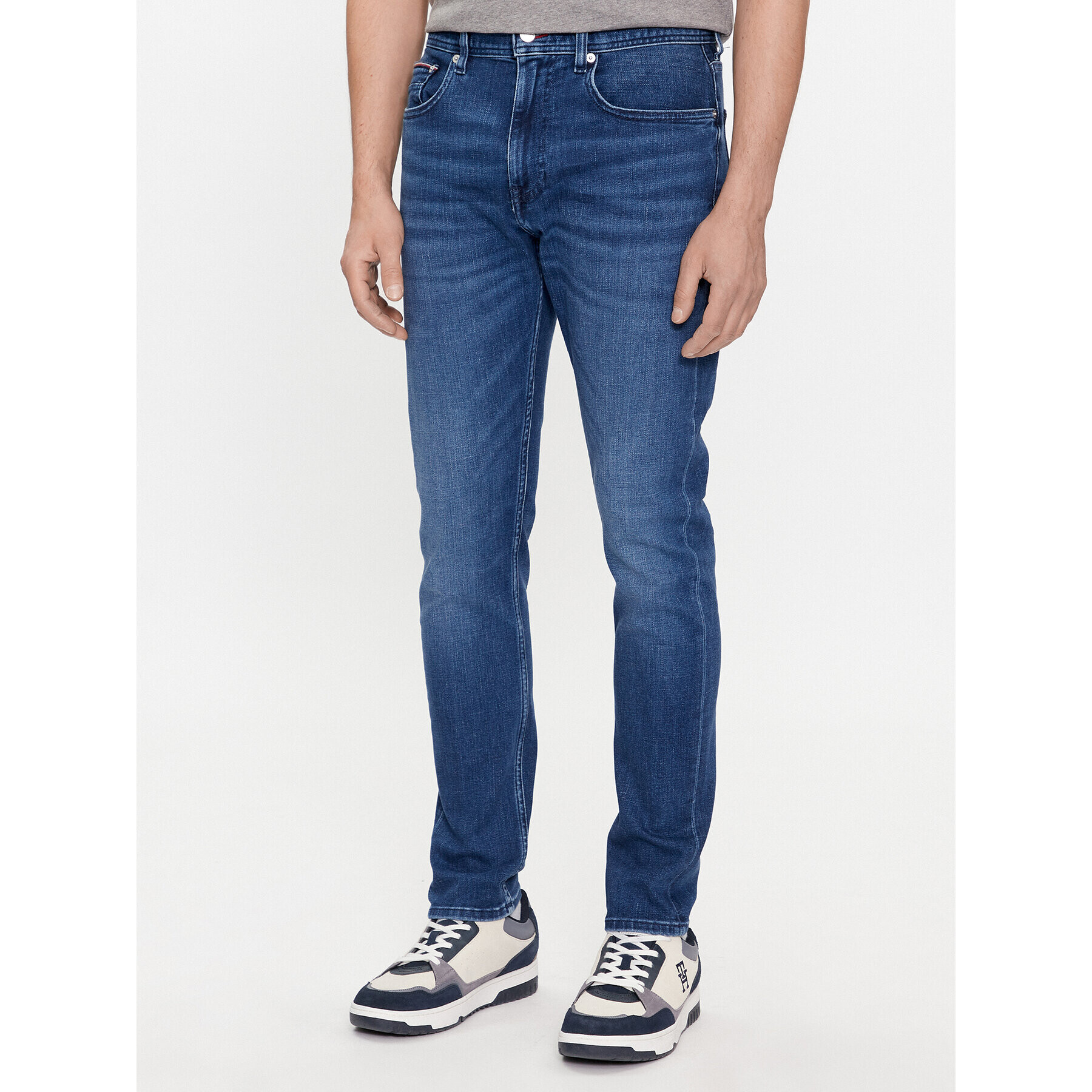 Tommy Hilfiger Jeans hlače Houston MW0MW33970 Mornarsko modra Tapered Fit - Pepit.si