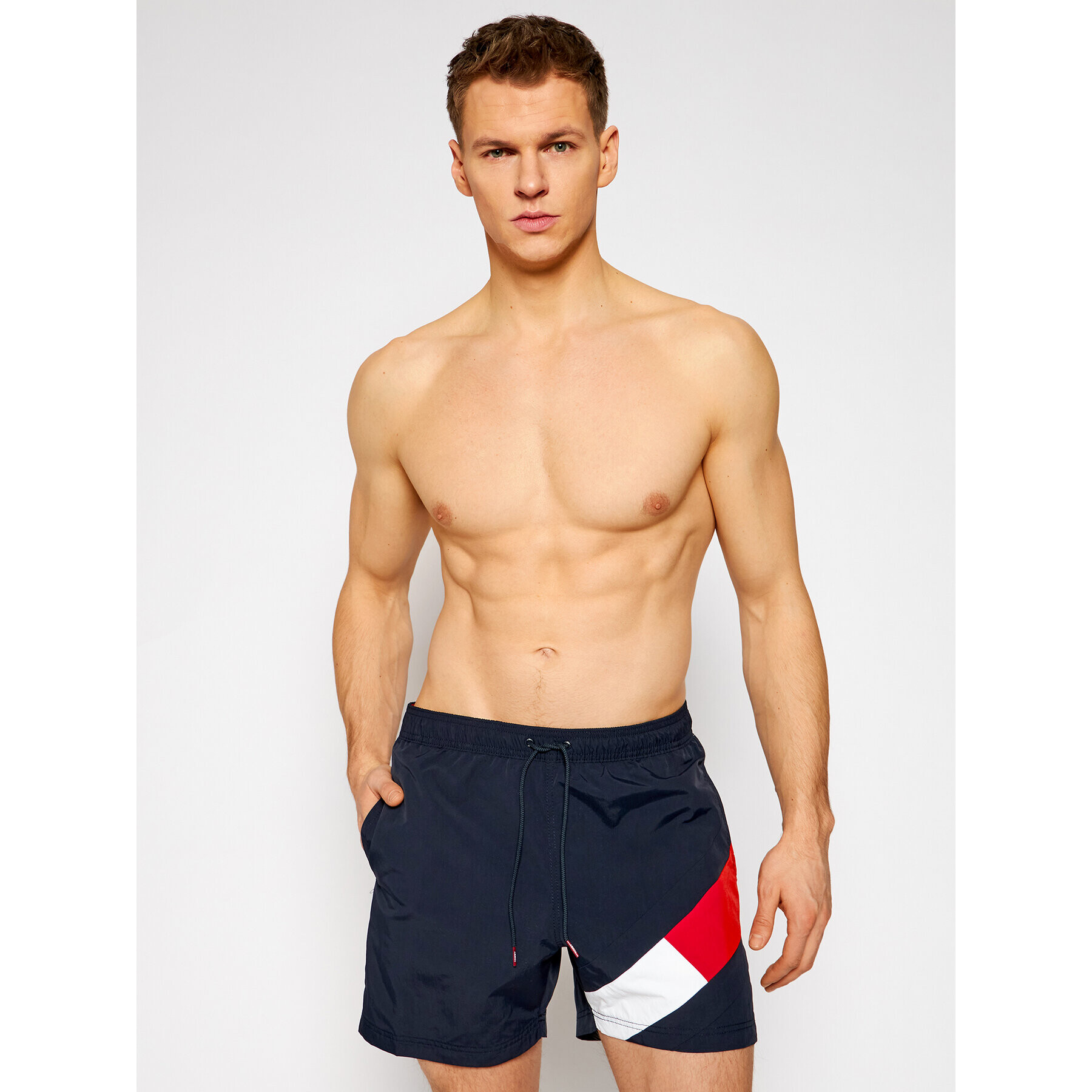 Tommy Hilfiger Kopalne hlače Sf Medium Drawstring UM0UM02048 Mornarsko modra Slim Fit - Pepit.si