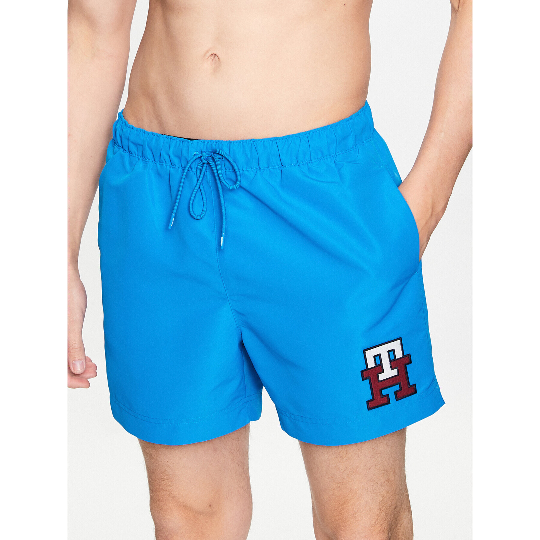 Tommy Hilfiger Kratke hlače za na plažo Medium Drawstring UM0UM02732 Modra Slim Fit - Pepit.si