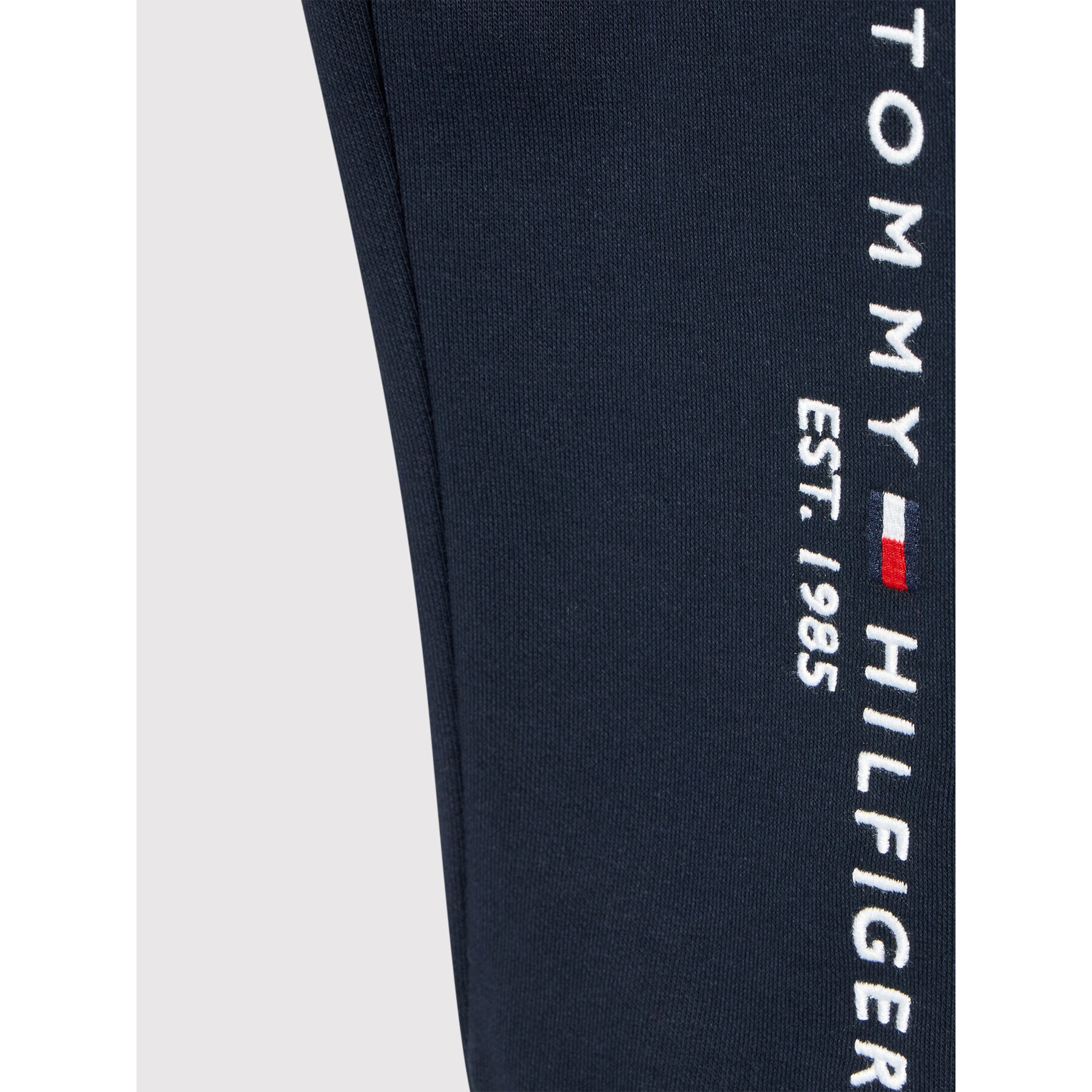 Tommy Hilfiger Spodnji del trenirke KG0KG06598 Mornarsko modra Regular Fit - Pepit.si