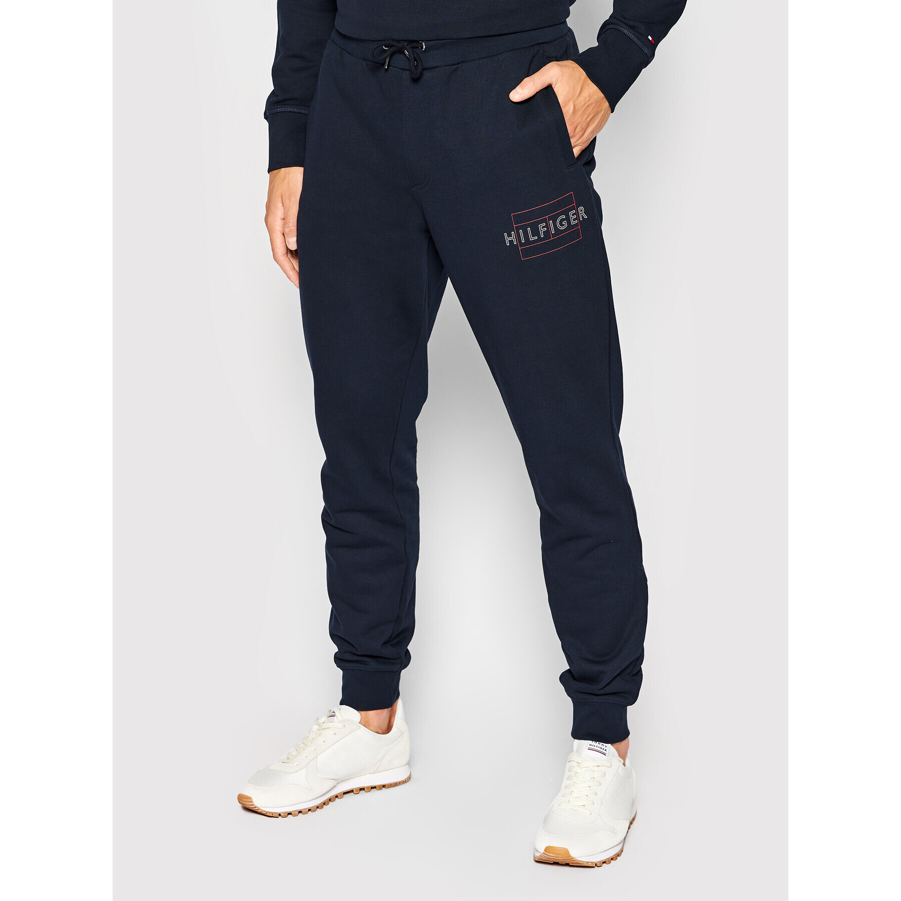 Tommy Hilfiger Spodnji del trenirke MW0MW25599 Mornarsko modra Regular Fit - Pepit.si