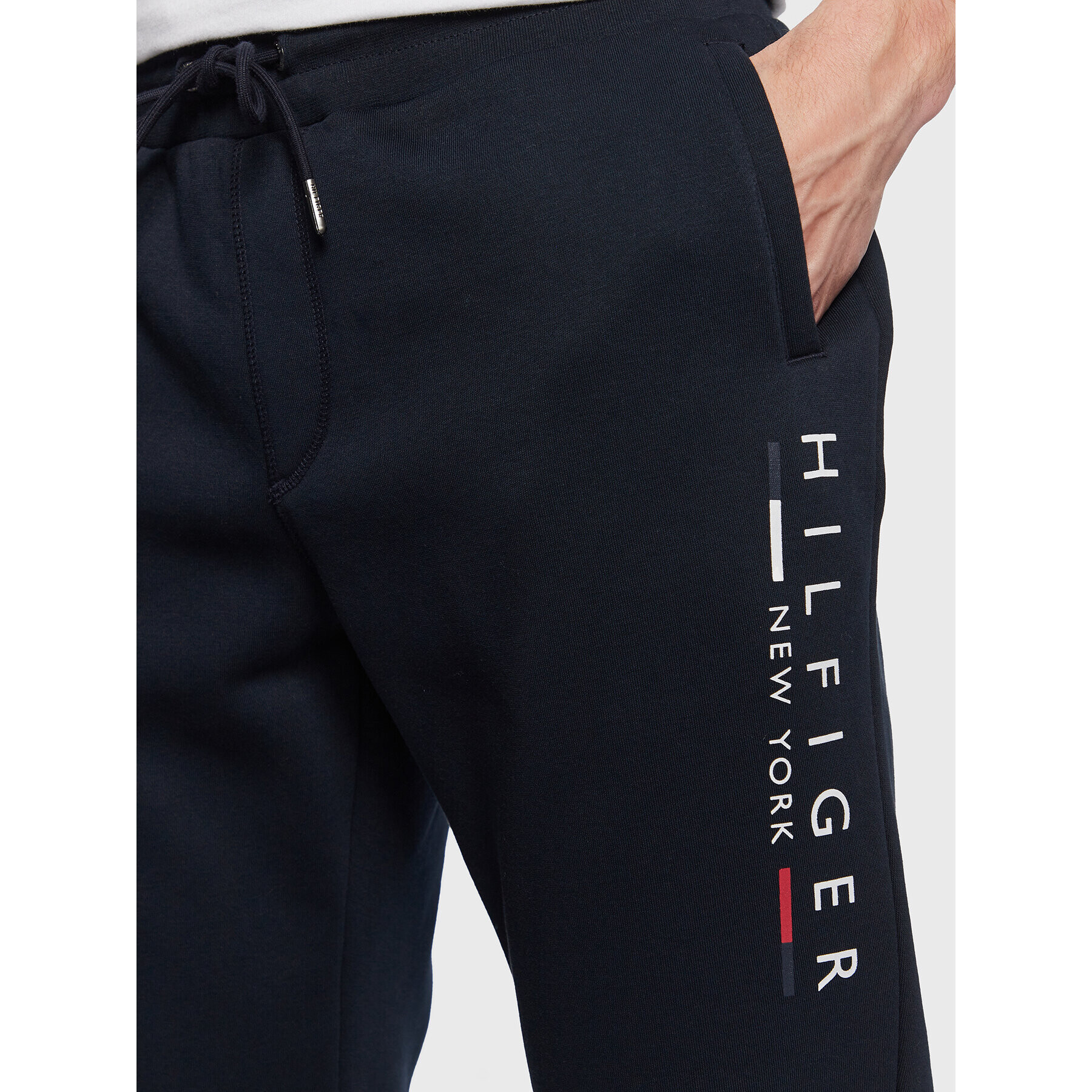 Tommy Hilfiger Spodnji del trenirke New York MW0MW29302 Mornarsko modra Regular Fit - Pepit.si