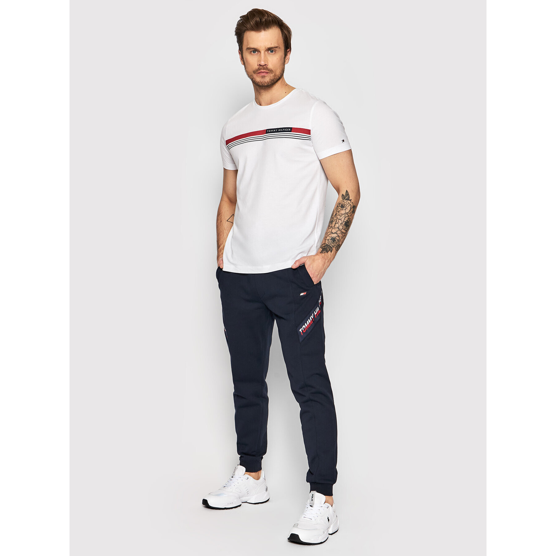 Tommy Hilfiger Spodnji del trenirke Tape MW0MW25073 Mornarsko modra Regular Fit - Pepit.si