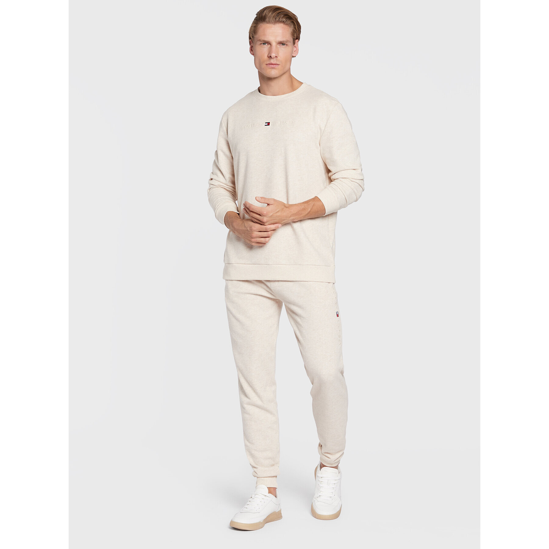 Tommy Hilfiger Spodnji del trenirke UM0UM02667 Bež Relaxed Fit - Pepit.si