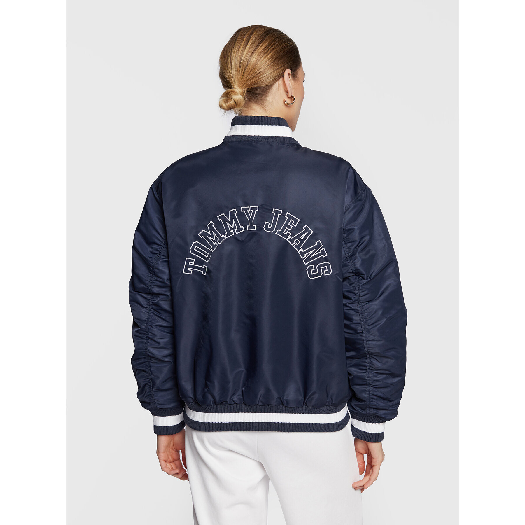 Tommy Jeans Bomber jakna Graphic DW0DW14936 Mornarsko modra Regular Fit - Pepit.si