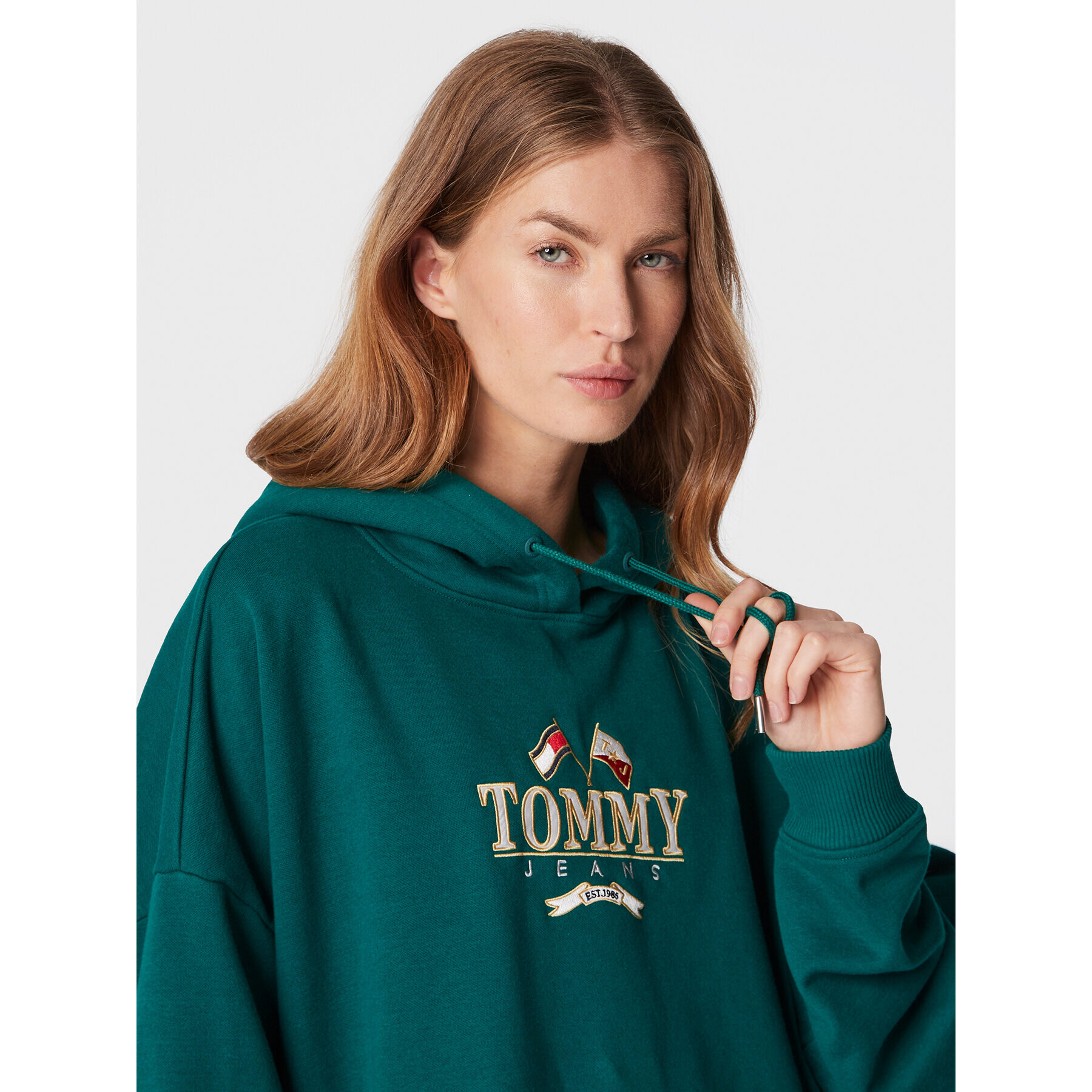 Tommy Jeans Pletena obleka DW0DW14405 Zelena Relaxed Fit - Pepit.si