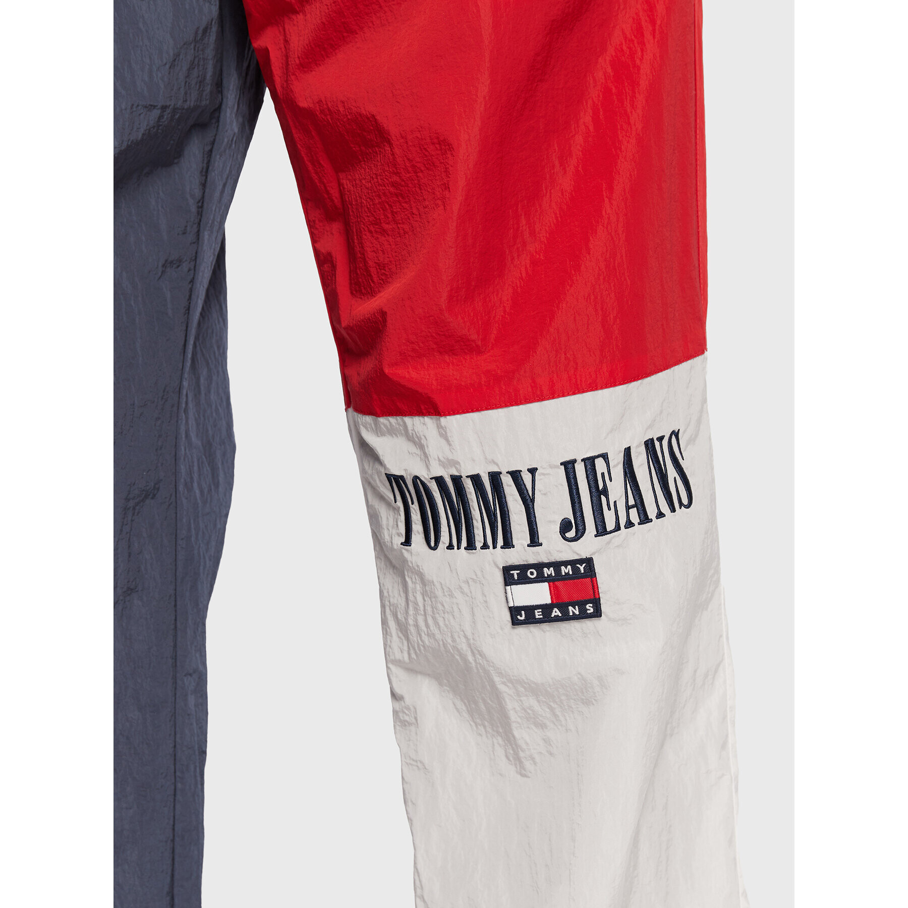 Tommy Jeans Spodnji del trenirke Archive DM0DM14473 Mornarsko modra Relaxed Fit - Pepit.si