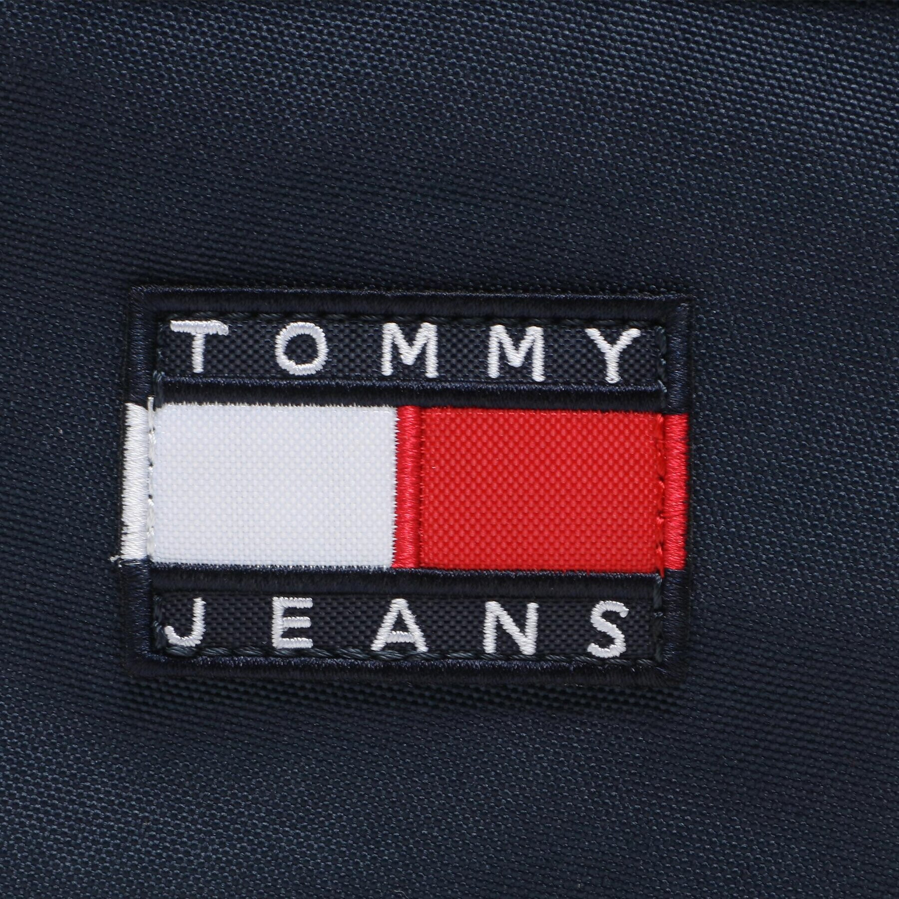 Tommy Jeans Torbica za okrog pasu Heritage Reporter AM0AM11159 Mornarsko modra - Pepit.si