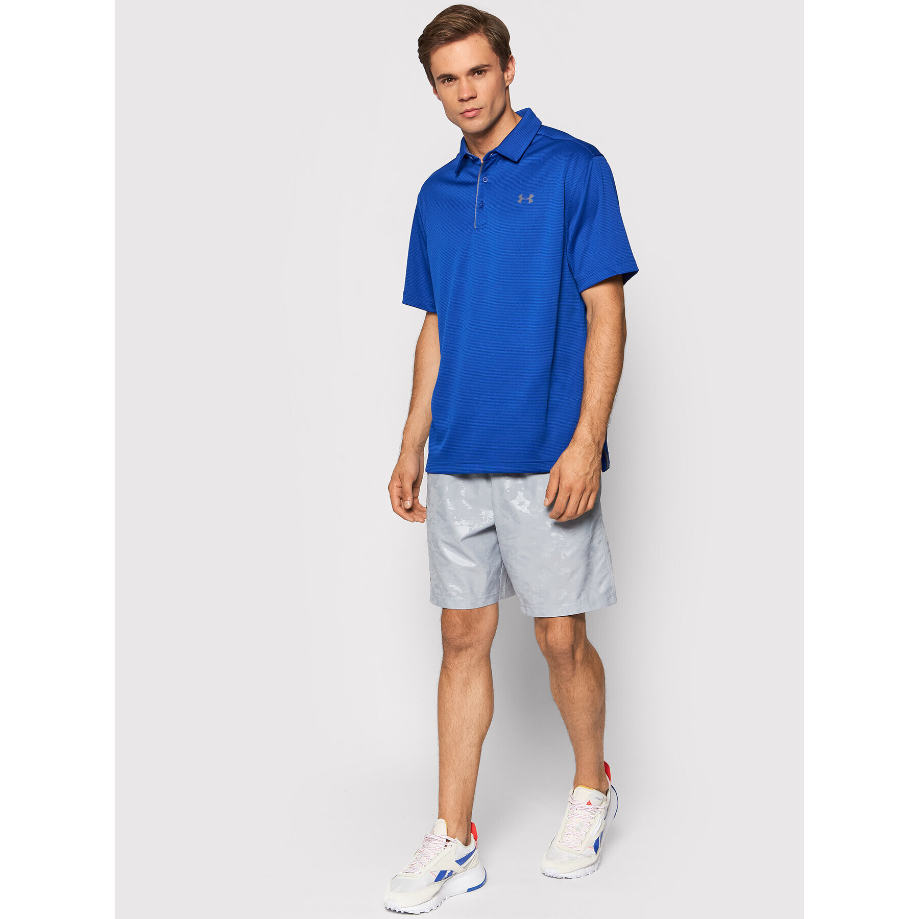 Under Armour Polo majica Ua Tech 1290140 Modra Loose Fit - Pepit.si