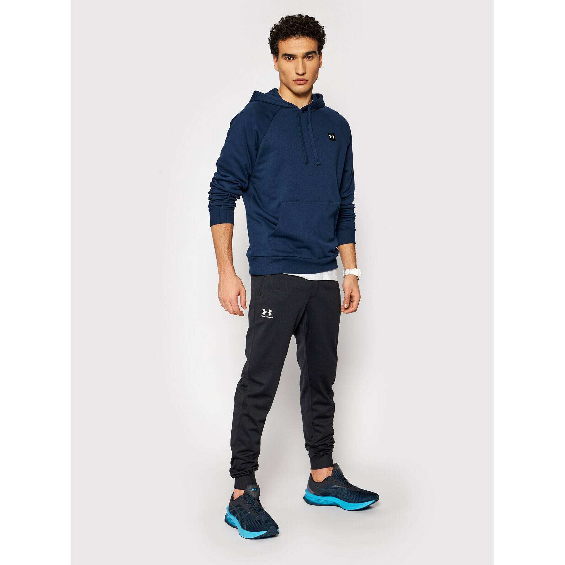 Under Armour Spodnji del trenirke Ua Sportstyle 1290261 Črna Relaxed Fit - Pepit.si