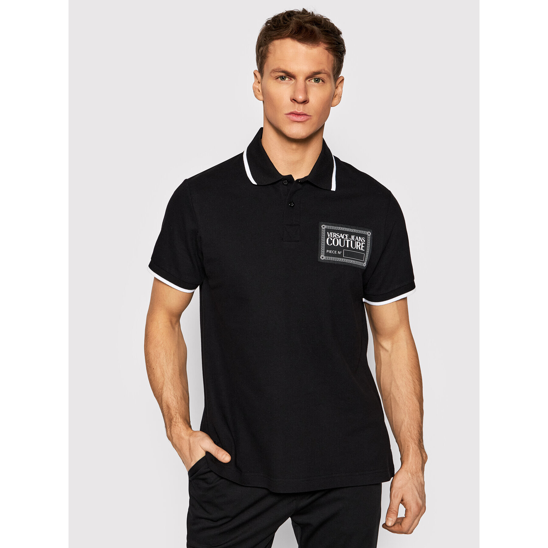 Versace Jeans Couture Polo majica Piece Nr Patch 72GAGT04 Črna Regular Fit - Pepit.si