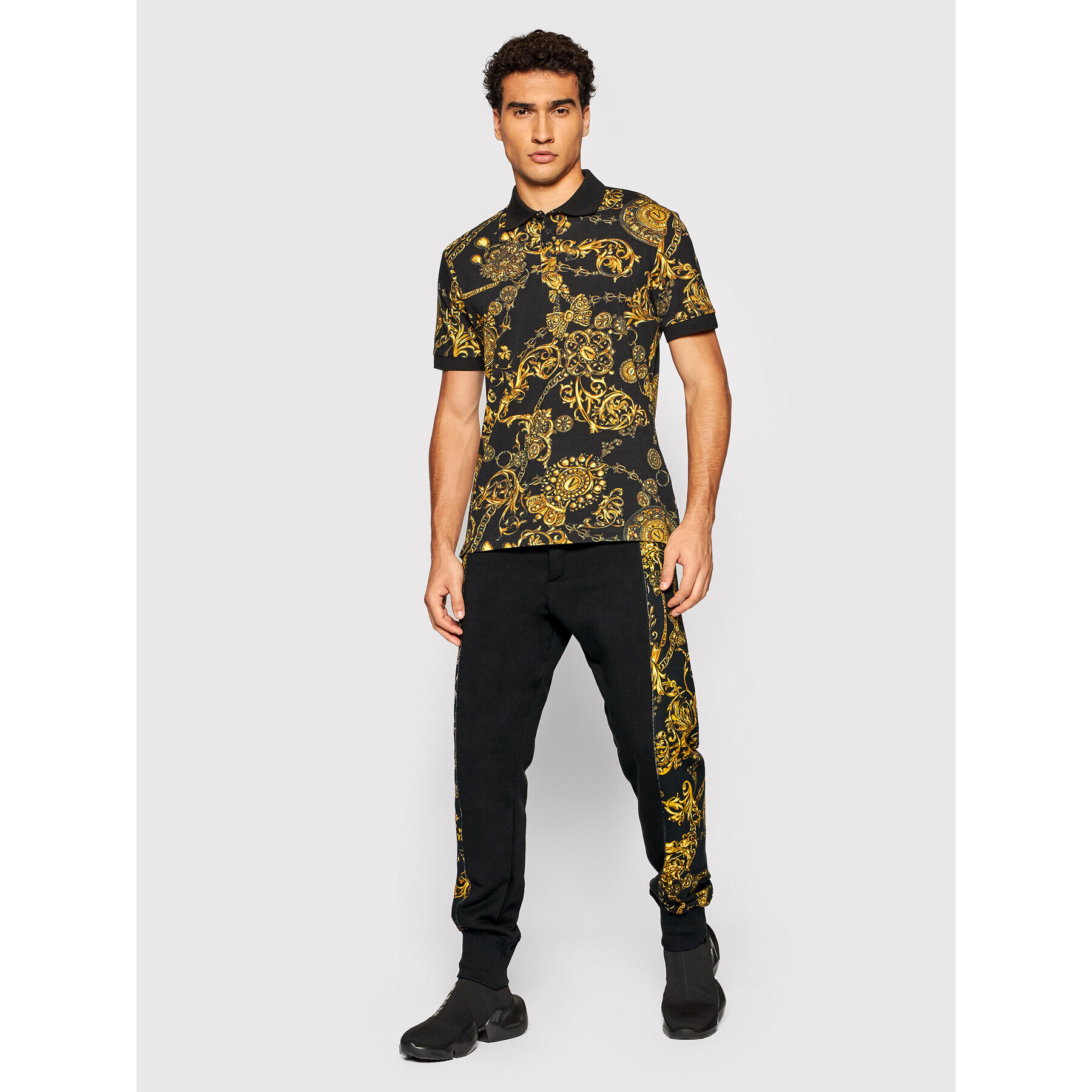 Versace Jeans Couture Spodnji del trenirke Contr Print Bjoux Baroque 71GAA3C0 Črna Regular Fit - Pepit.si